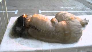 Oh look, a creepy sleeping woman made entirely out of candles